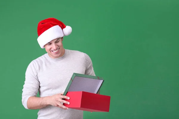 Handsome man in Christmas hat — Stock Photo, Image