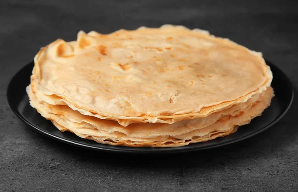 Plate with tasty buckwheat thin pancakes — Stock Photo, Image