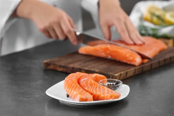 Plate with fresh salmon slices