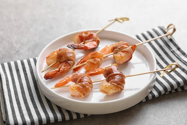 Shrimps wrapped in bacon — Stock Photo, Image