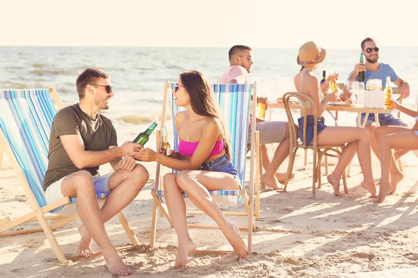 Young people having party on beach — Stock Photo, Image