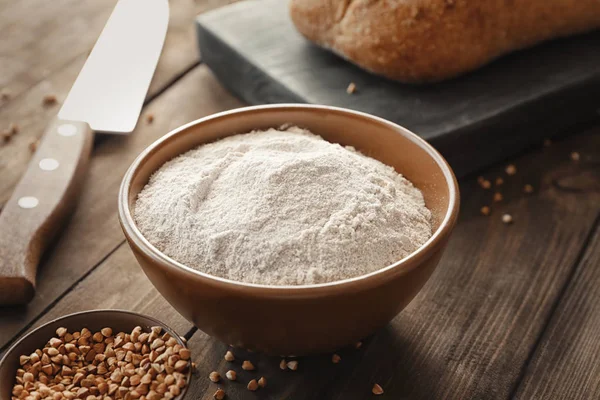 Bowl with buckwheat flour — Stock Photo, Image