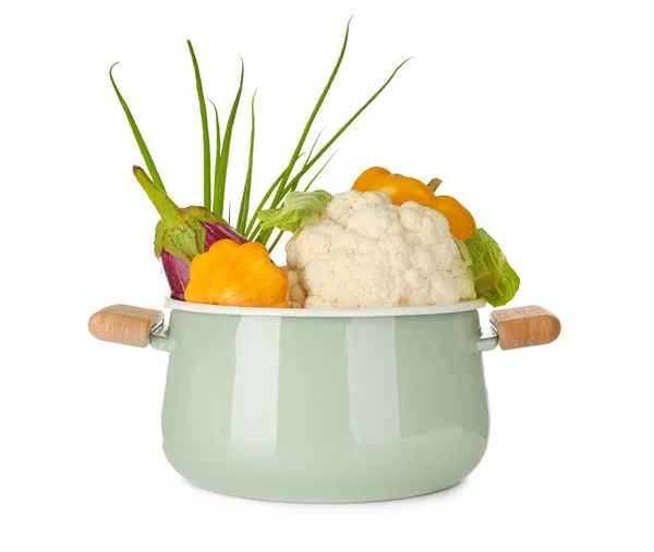 Saucepan with vegetables on white background — Stock Photo, Image