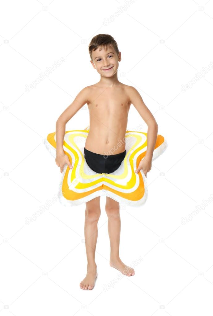 Cute little boy with inflatable ring in shape of star on white background