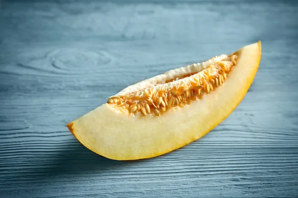 Ripe melon on wooden table — Stock Photo, Image