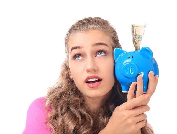 Young woman holding piggy bank — Stock Photo, Image