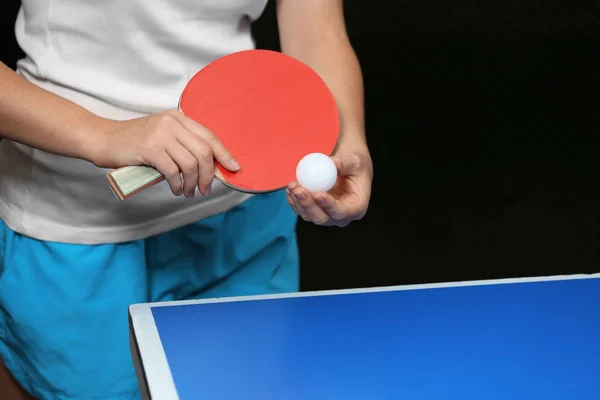 Woman playing table tennis indoors — Stock Photo, Image