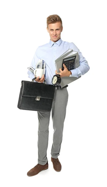 Ung chef hålla flera saker, isolerad på vit — Stockfoto