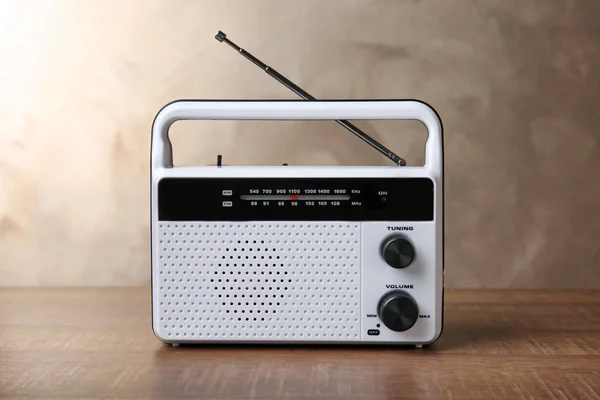 Retro radio on color background