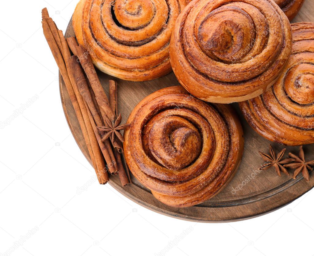 Wooden board with sweet cinnamon rolls