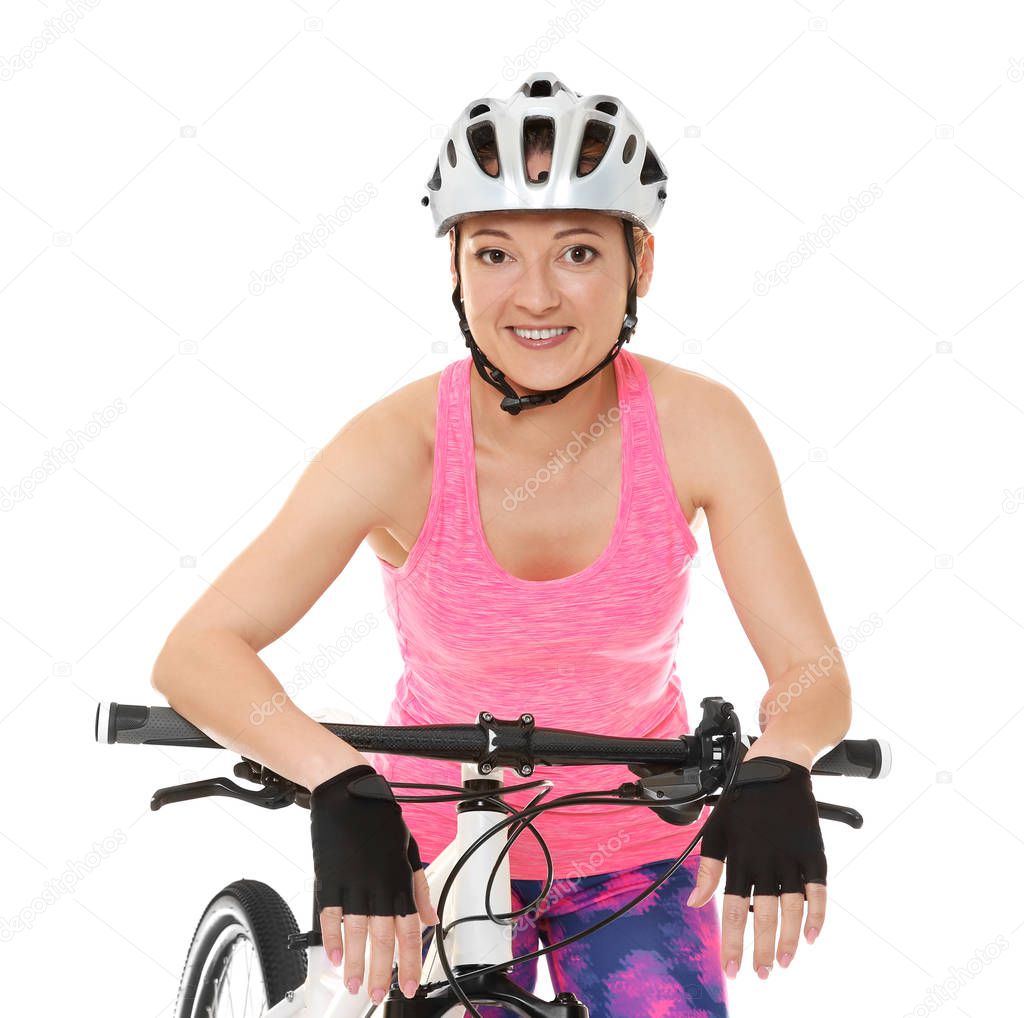 Young cyclist with bicycle