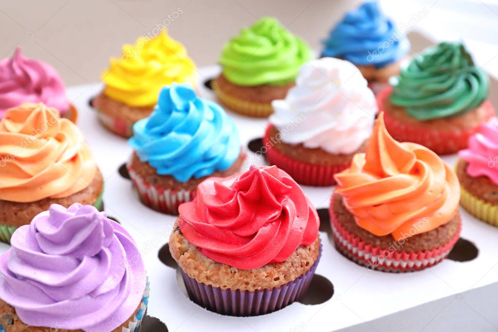 Tasty colorful cupcakes 