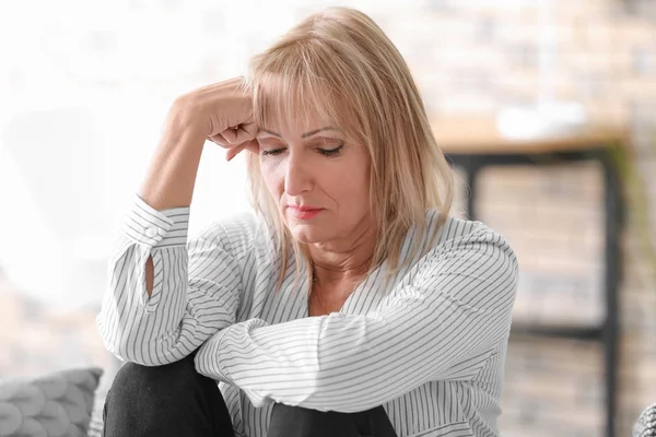 Upset mature woman at home — Stock Photo, Image