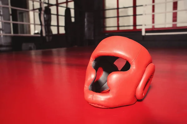 Headgear on boxing ring in gym — Stock Photo, Image