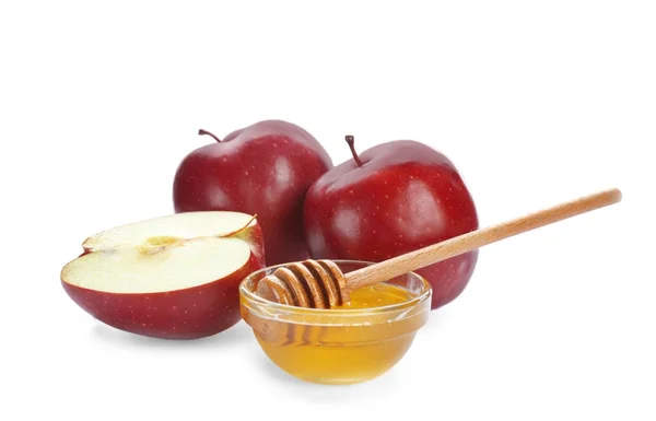 成熟的红苹果和蜂蜜碗 — 图库照片