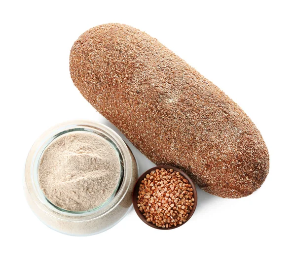 Buckwheat flour and fresh bread — Stock Photo, Image