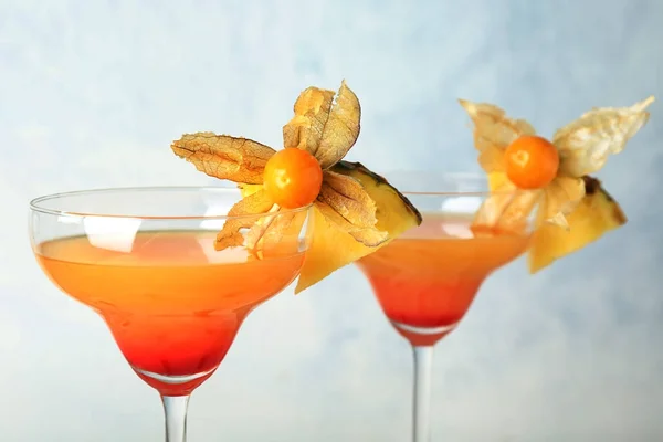 Glasses with tasty exotic cocktail — Stock Photo, Image