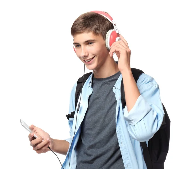 Menino adolescente em roupas casuais ouvindo música — Fotografia de Stock