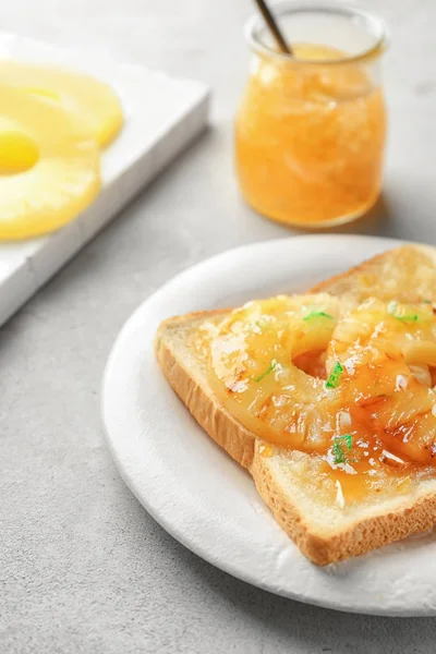 Plate of delicious toast with pineapples — Stock Photo, Image