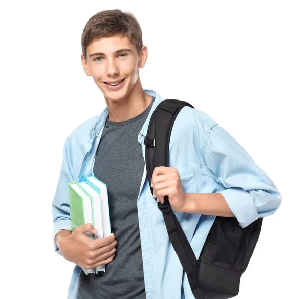 Adolescente menino com mochila e livros — Fotografia de Stock