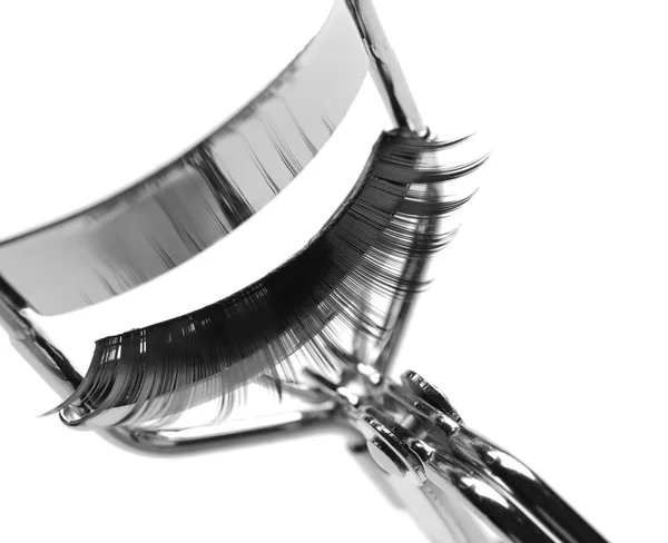 Curler and false eyelashes — Stock Photo, Image