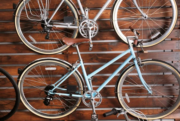 Stand with new bicycles in shop — Stock Photo, Image