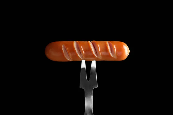 Fork with delicious grilled sausage — Stock Photo, Image