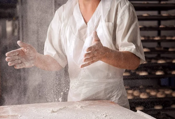 Man preparing buns