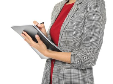 Beyaz arka plan, closeup not defterinde yazılı güzel genç Yöneticisi