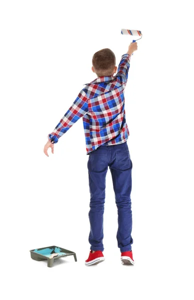 Cute little boy with paint roller on white background — Stock Photo, Image