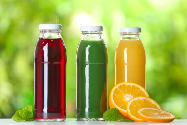 Bottles with fresh juices — Stock Photo, Image