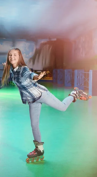 Charming teenage girl at roller skating rink — Stock Photo, Image
