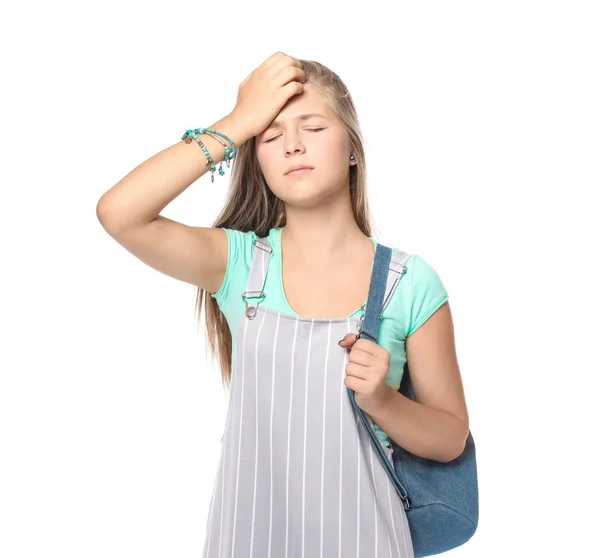 Cute teenager girl suffering from headache on white background — Stock Photo, Image