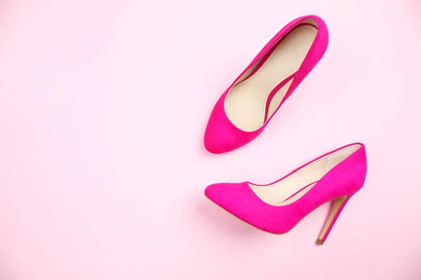 Pair of stylish shoes on color background — Stock Photo, Image