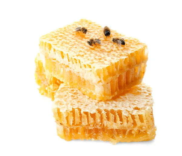 Honingraat met bijen op de achtergrond — Stockfoto