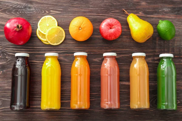 Composición con botellas de zumos de frutas —  Fotos de Stock