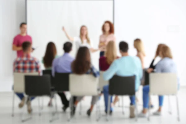 Blurred view of people at business training — Stock Photo, Image