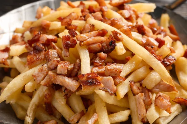 Dish with french fries and bacon
