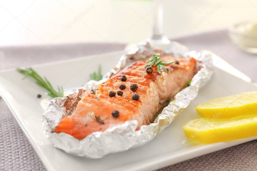 Plate with tasty grilled salmon 
