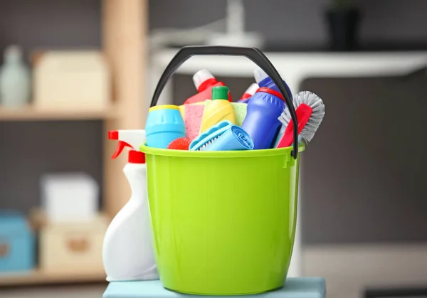 Bucket with cleaning products — Stock Photo, Image