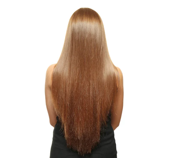 Mujer joven con hermoso pelo largo de color caramelo sobre fondo blanco —  Fotos de Stock