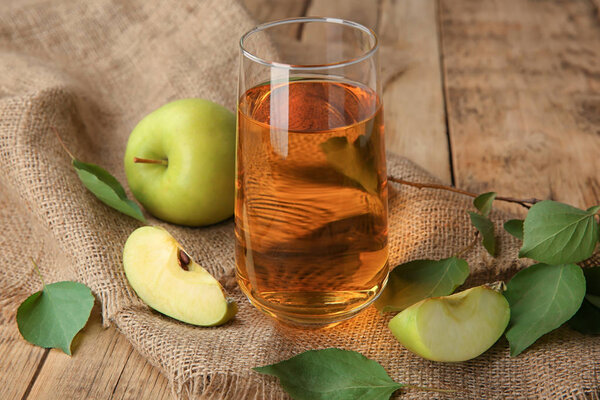 Glass with fresh apple juice 