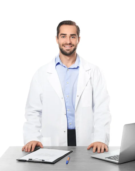 Young pharmacist with laptop — Stock Photo, Image