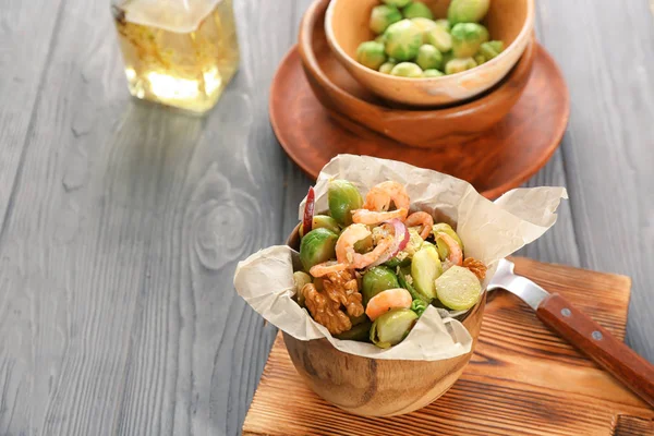 Wooden bowl with brussel sprout salad — Stock Photo, Image