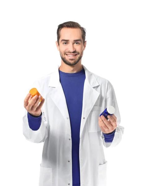 Young pharmacist with pills — Stock Photo, Image