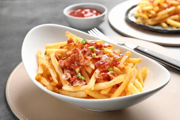 Plate with french fries and bacon — Stock Photo, Image