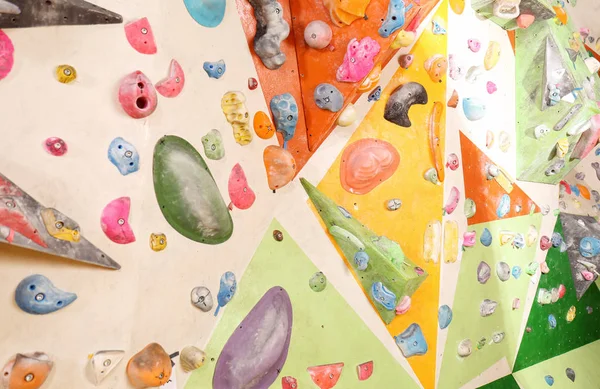 Climbing wall with artificial boulders — Stock Photo, Image