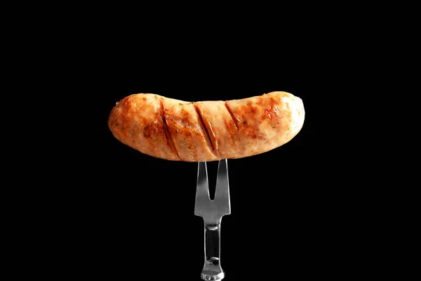Вилка зі смачною ковбасою на грилі — стокове фото