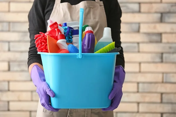 Woman holding bucket — Stock Photo, Image