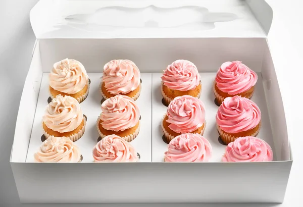 Yummy cupcakes in box — Stock Photo, Image